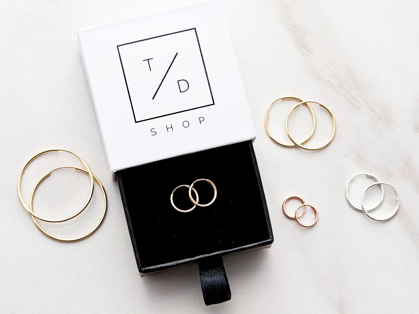 Boucles d'oreilles créoles sans fin