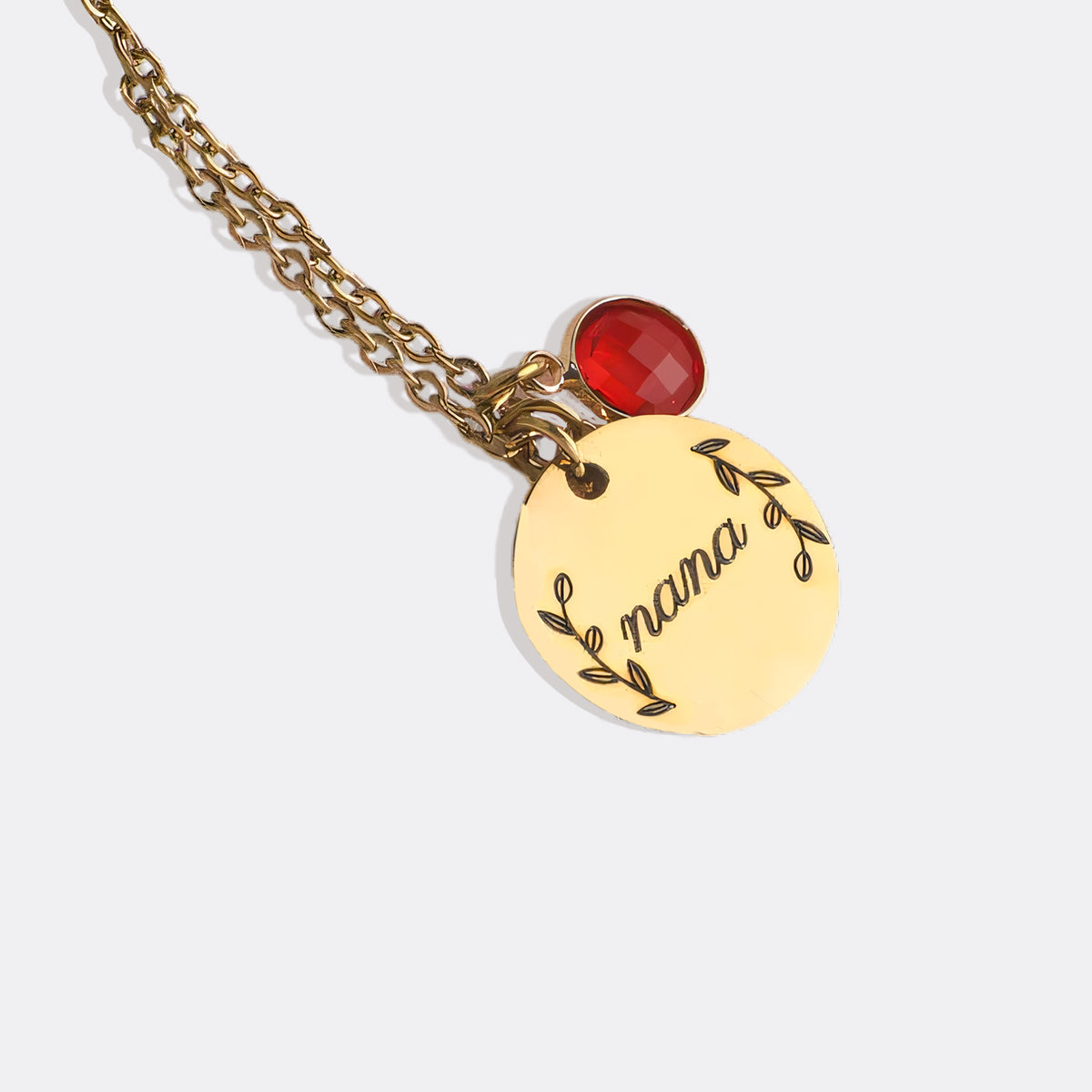 Collier pendentif pierre de naissance gravée avec feuilles