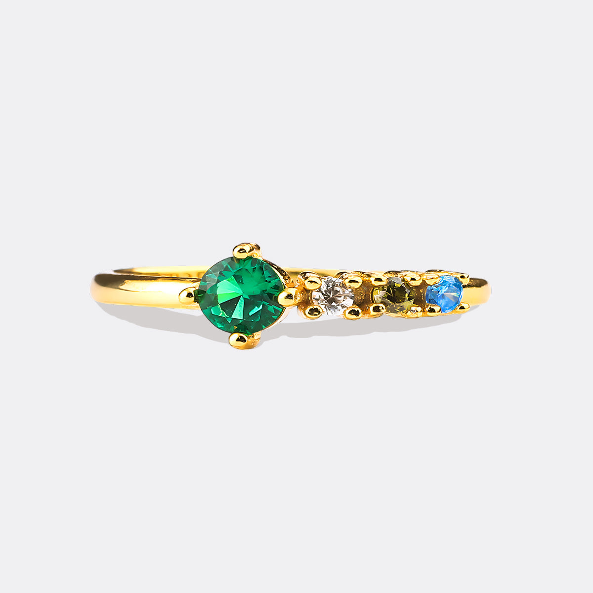Bague avec pierres de naissance familiales