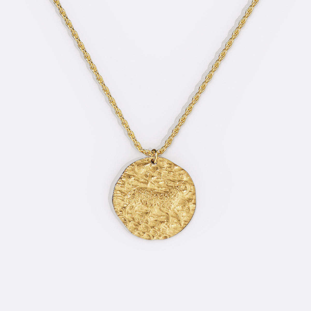 Collier pendentif zodiaque en or martelé