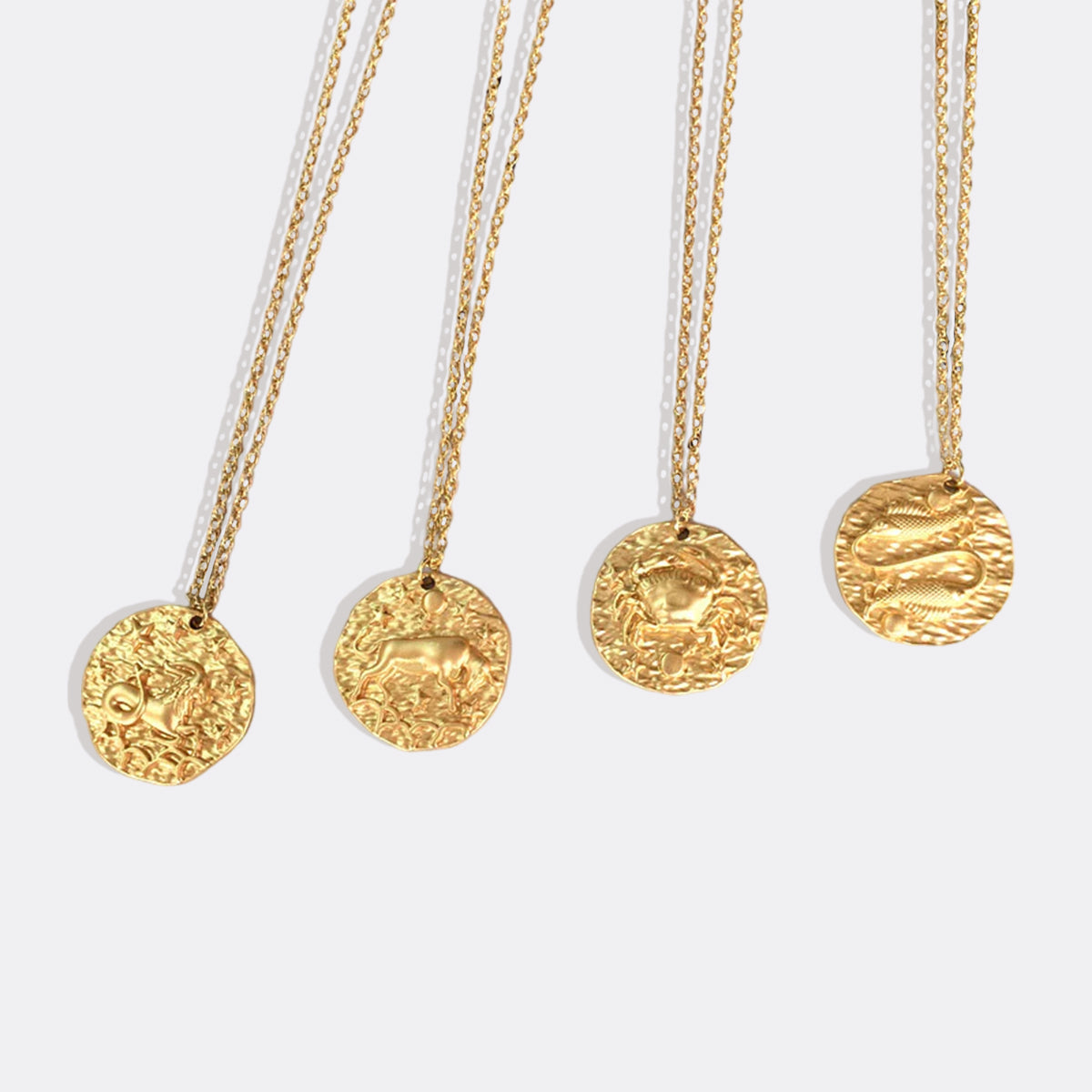 Collier pendentif zodiaque en or martelé