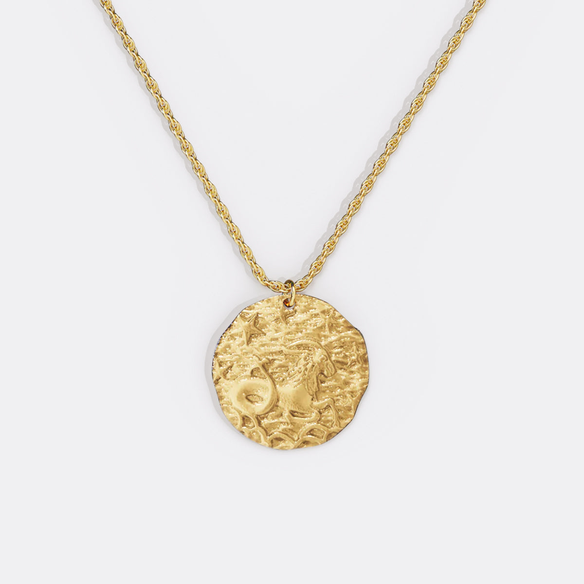 Collier pendentif zodiaque en or martelé