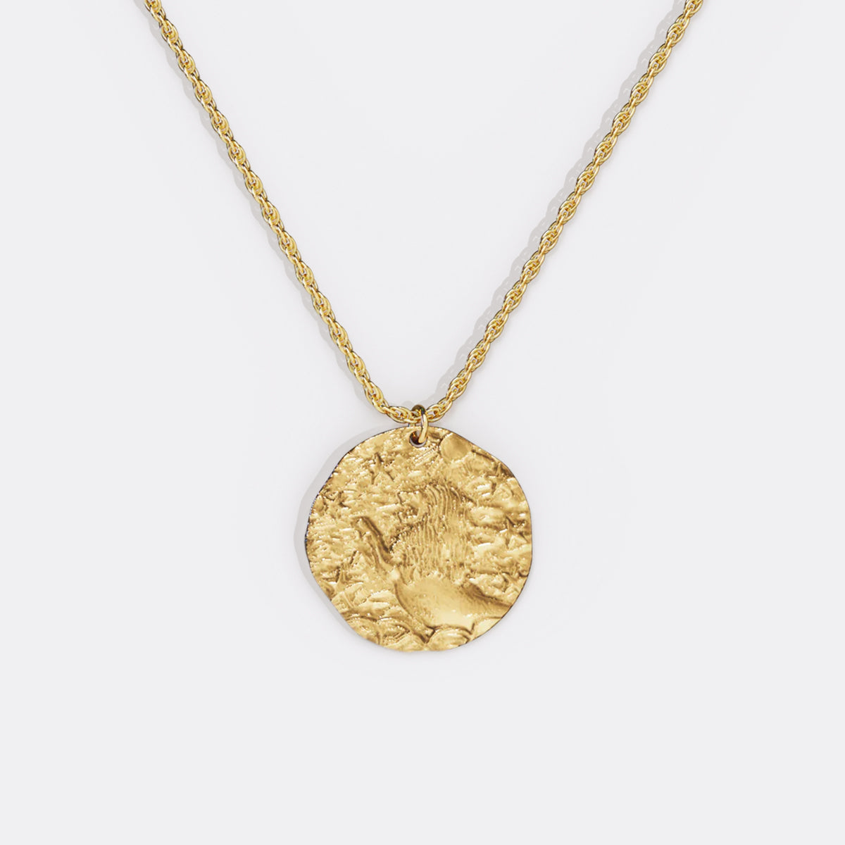 Collier pendentif zodiaque en or martelé