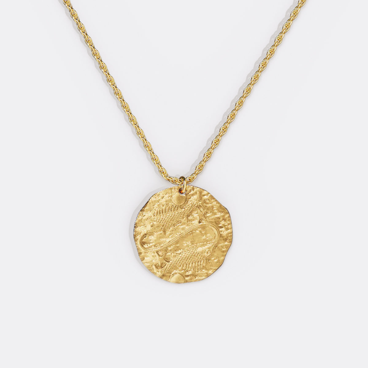 Collier pendentif zodiaque en or martelé