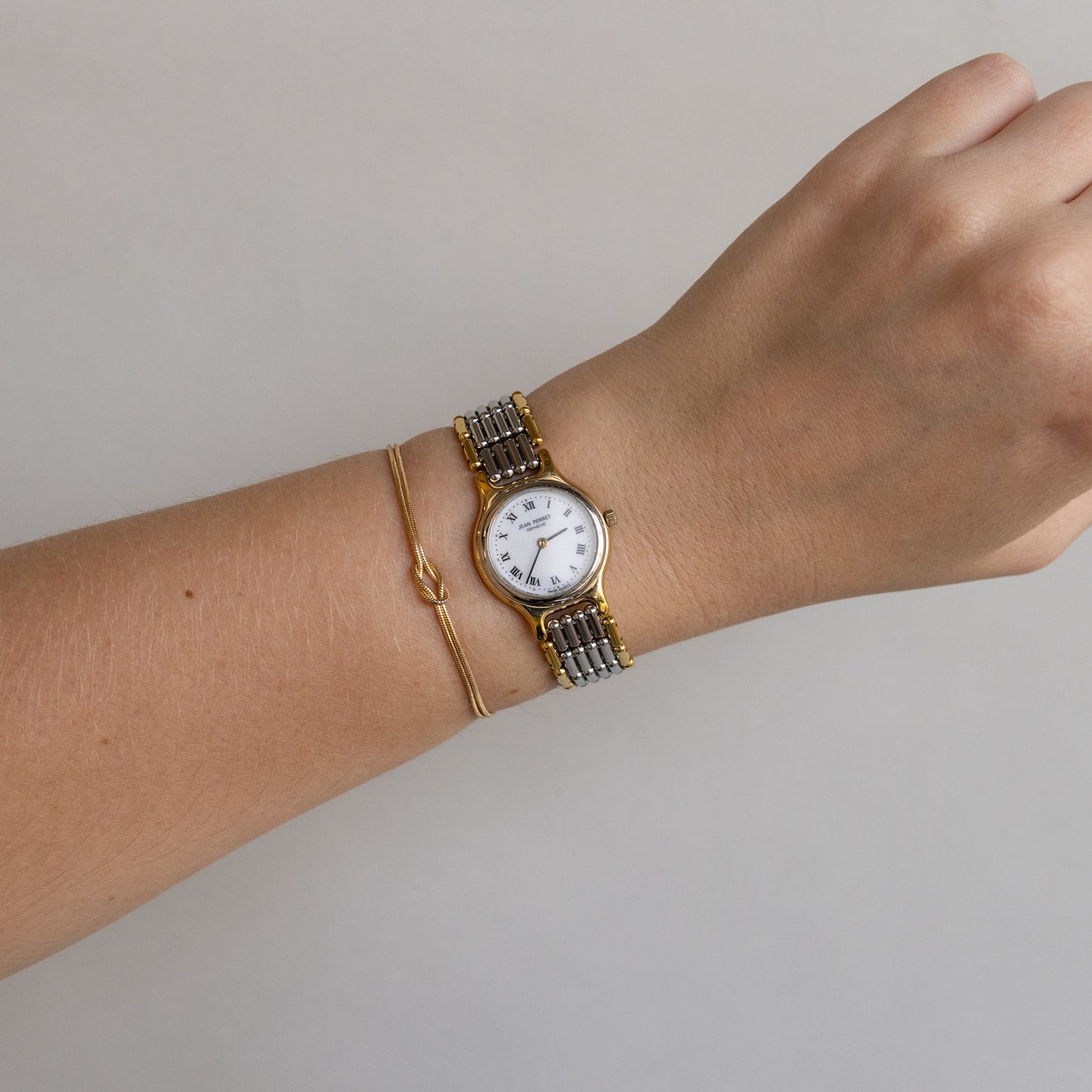 Montre vintage Jean Perret bicolore