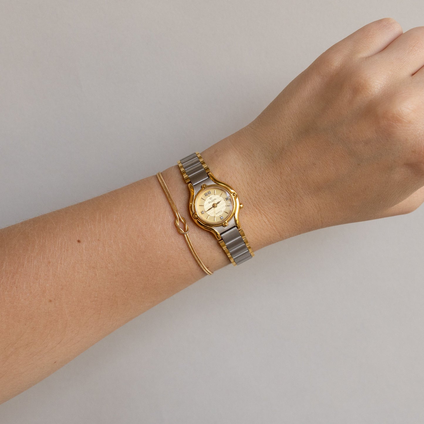 Montre ronde bicolore vintage Elgin