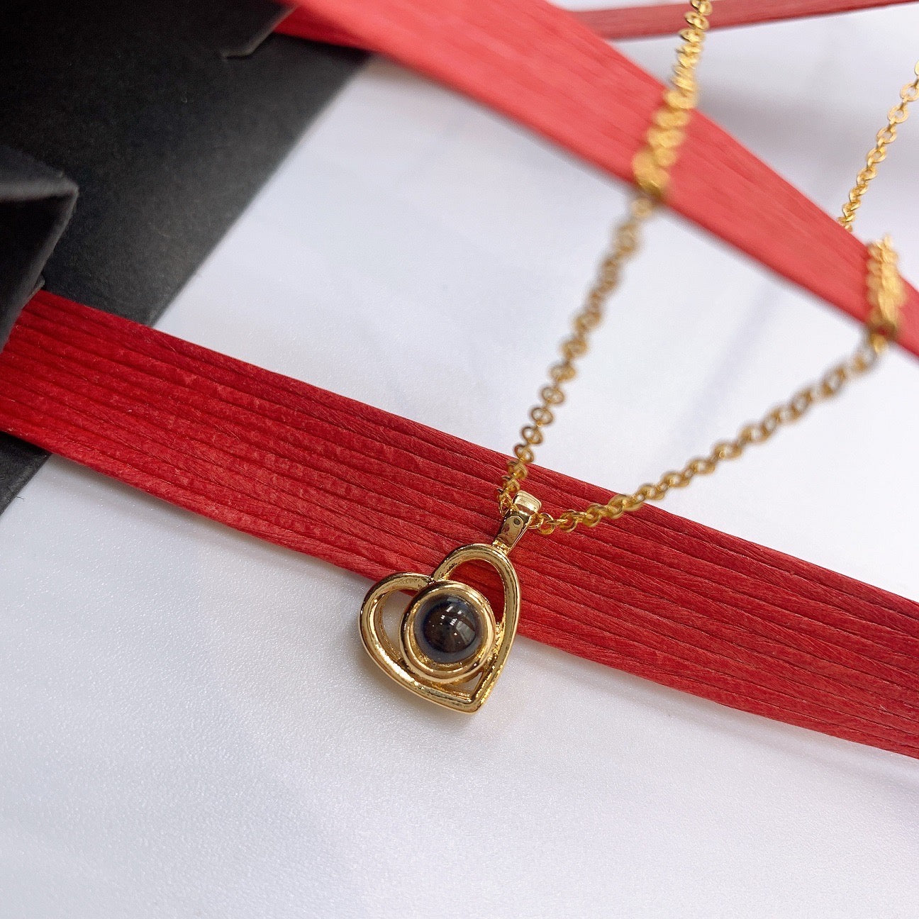 Collier de projection de petit cœur