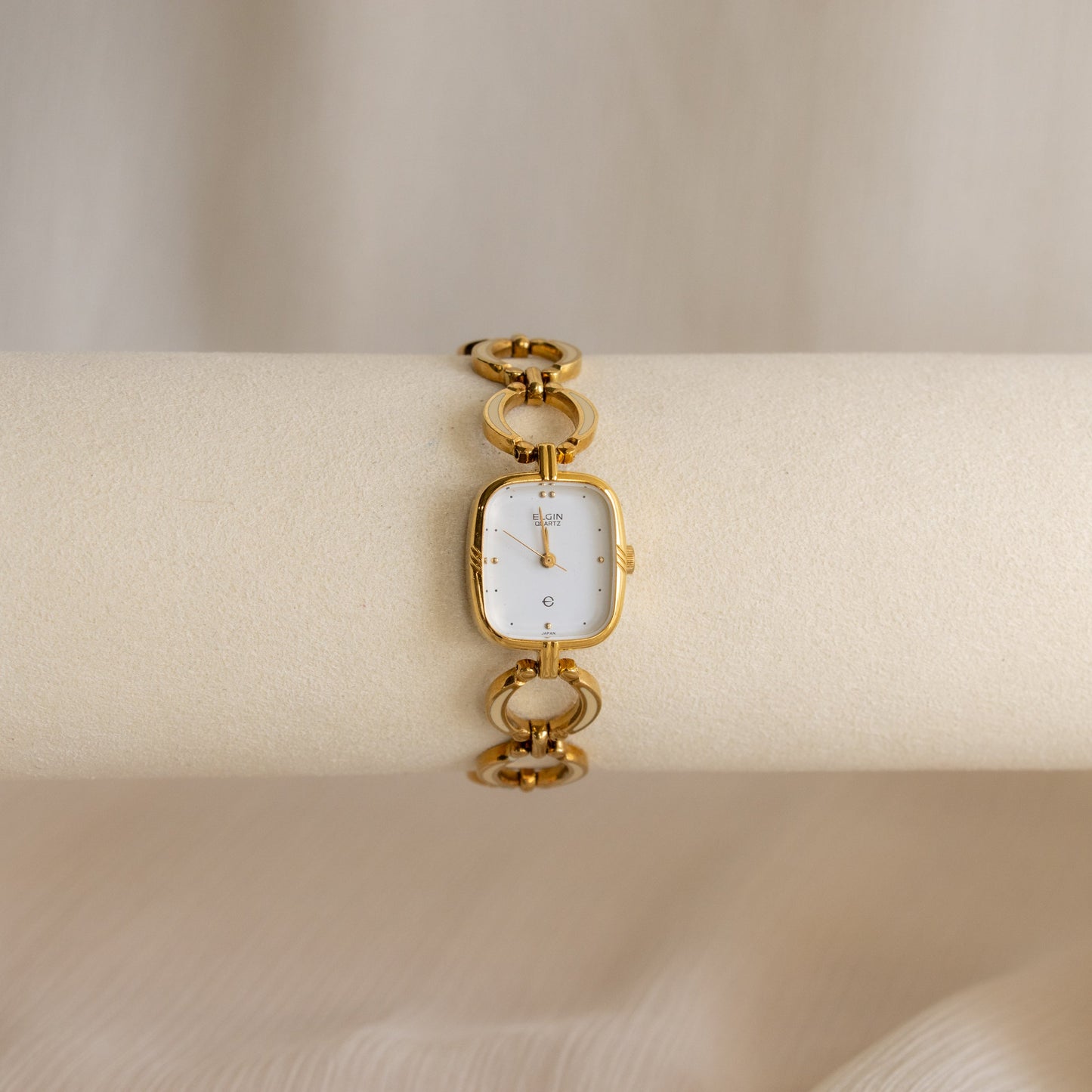 Montre vintage Elgin Square en or