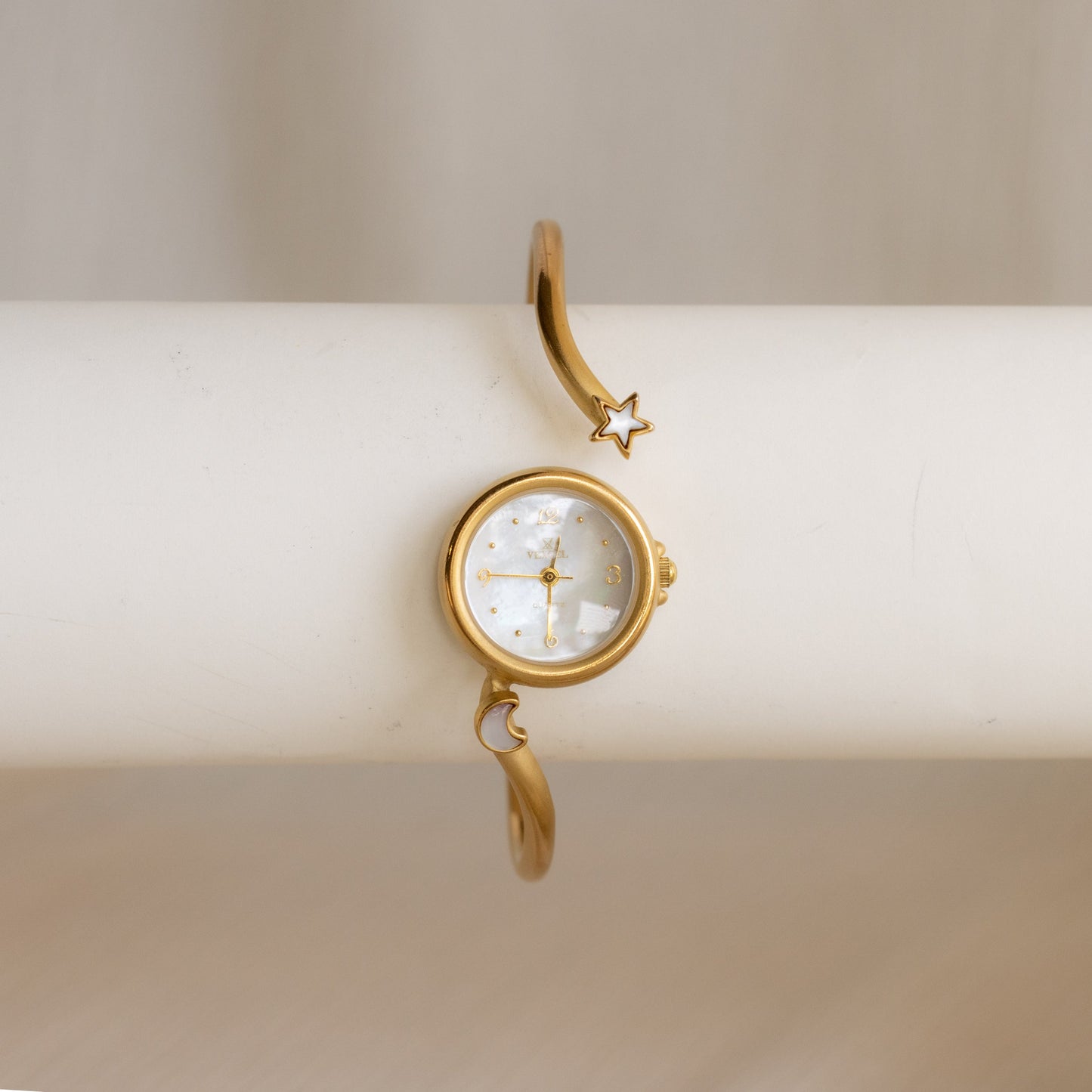 Montre-bracelet vintage Vexcel Celestial en or
