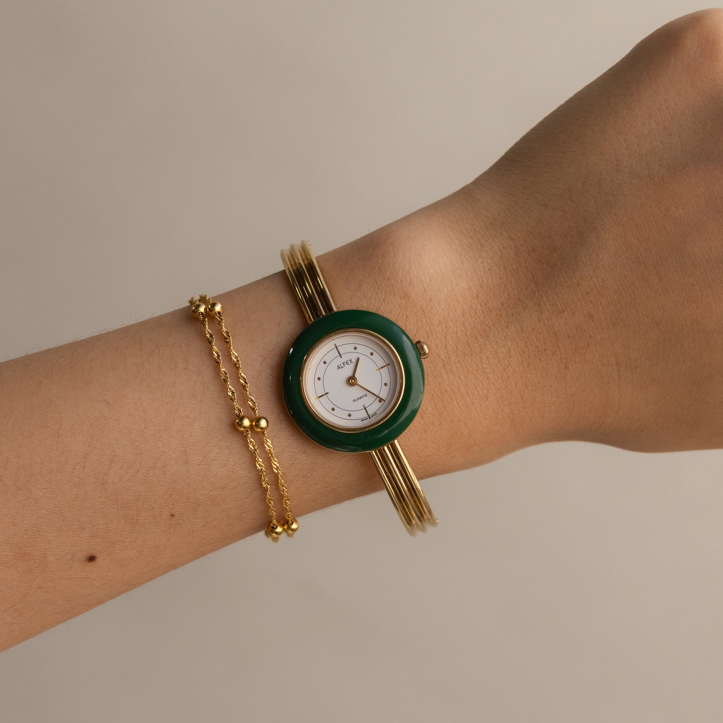 Montre-bracelet fine suisse vintage Alfex en or