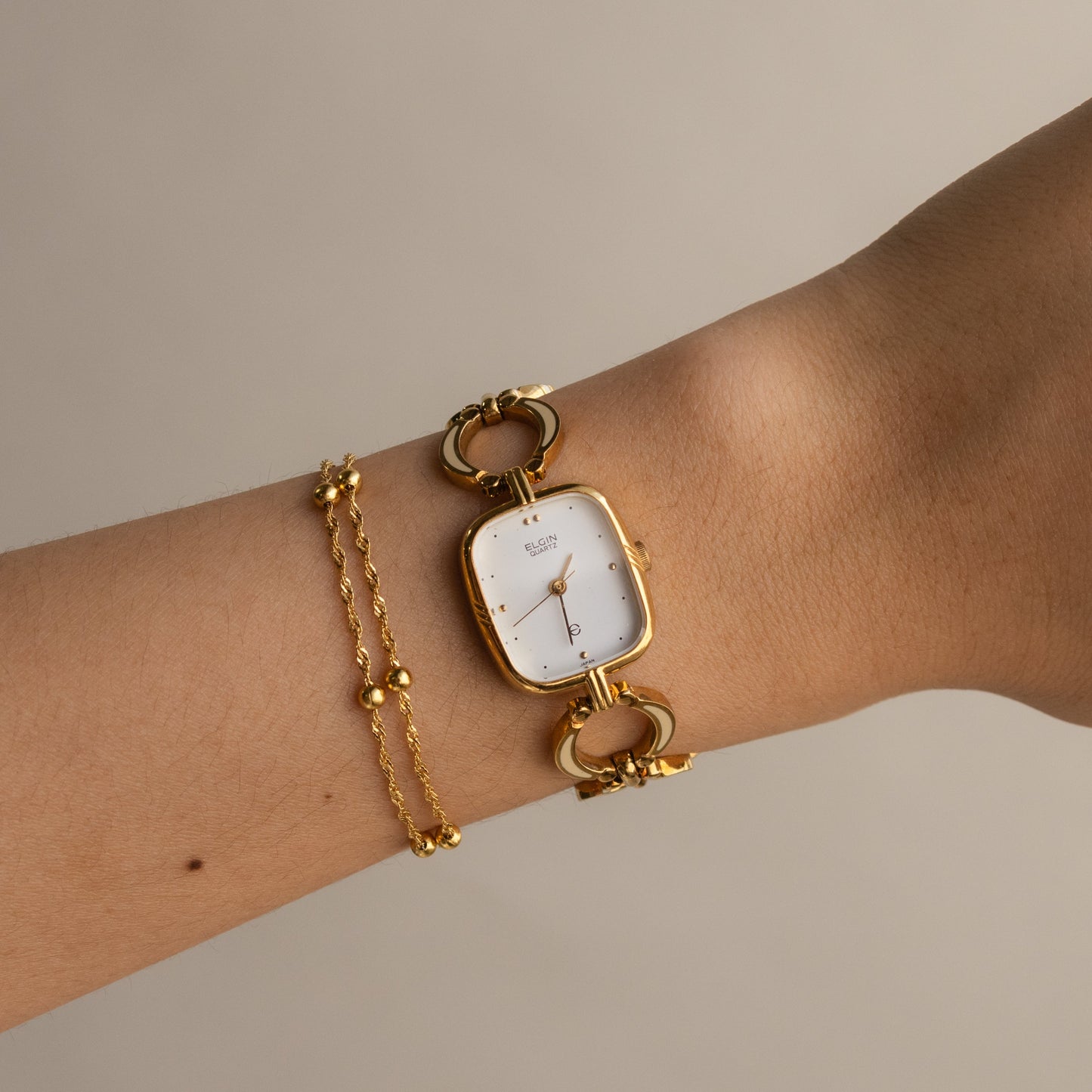 Montre vintage Elgin Square en or