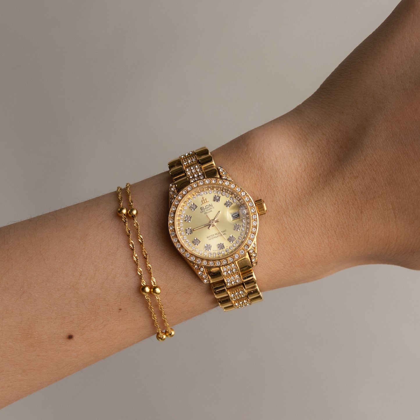 Montre vintage Elgin Bold Pave en or