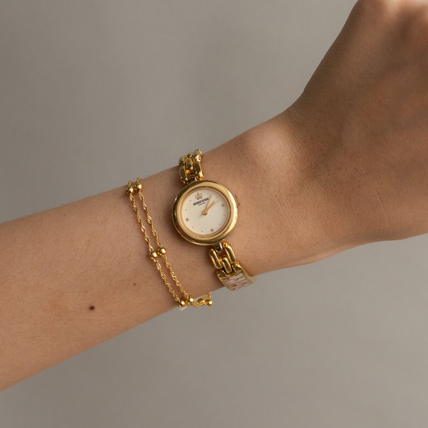 Montre Michiko Kishino ronde en or vintage