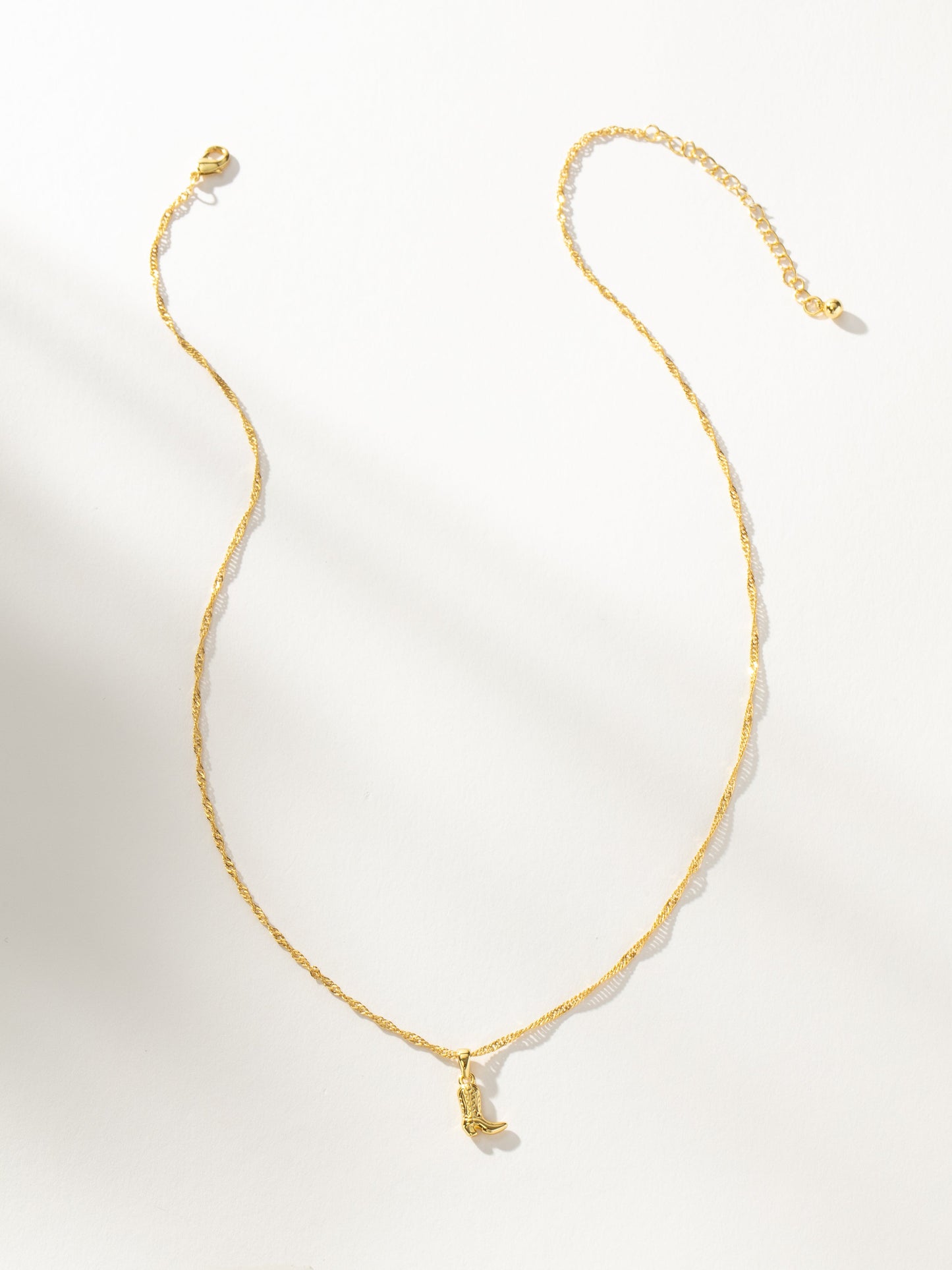 Collier pendentif botte de cowboy