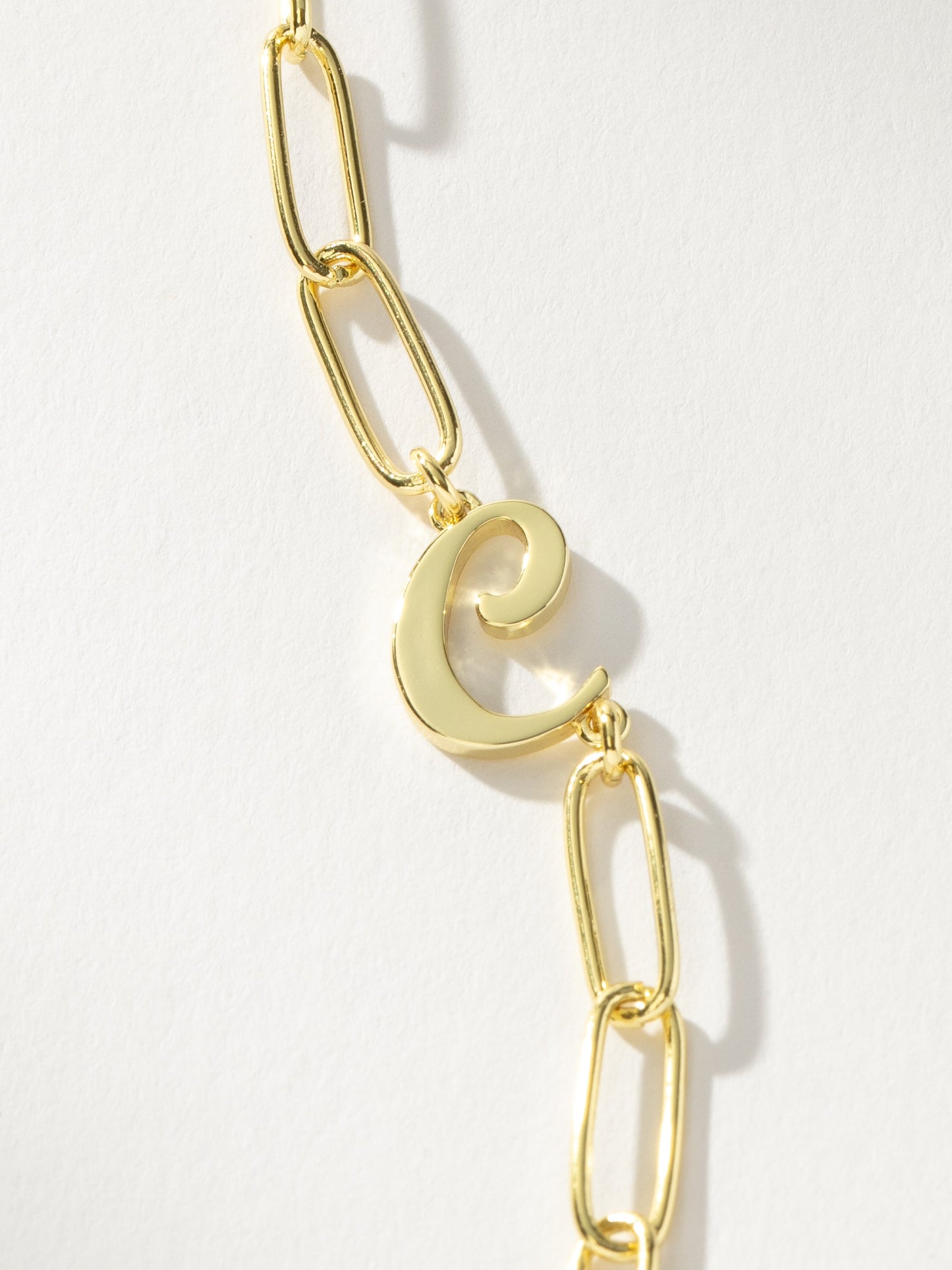 Collier avec initiales cursives