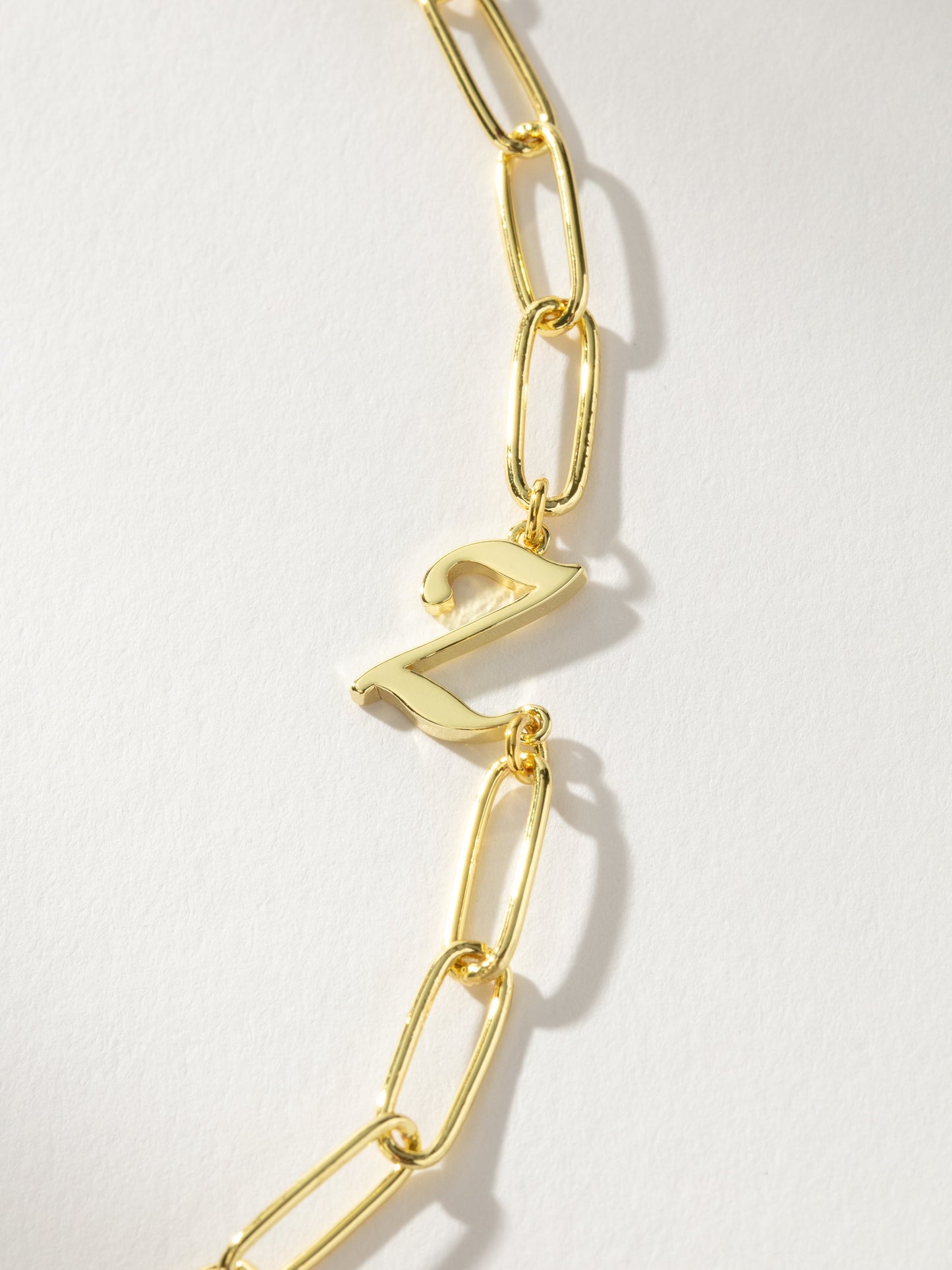 Collier avec initiales cursives