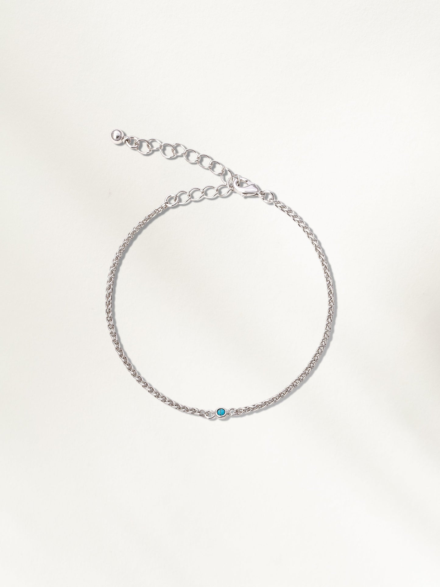 Bracelet en pierres précieuses et chaîne