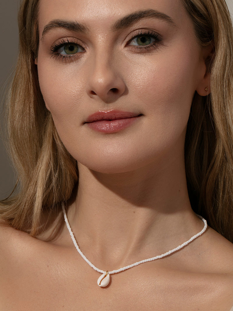 Collier de perles en coquillage Puka