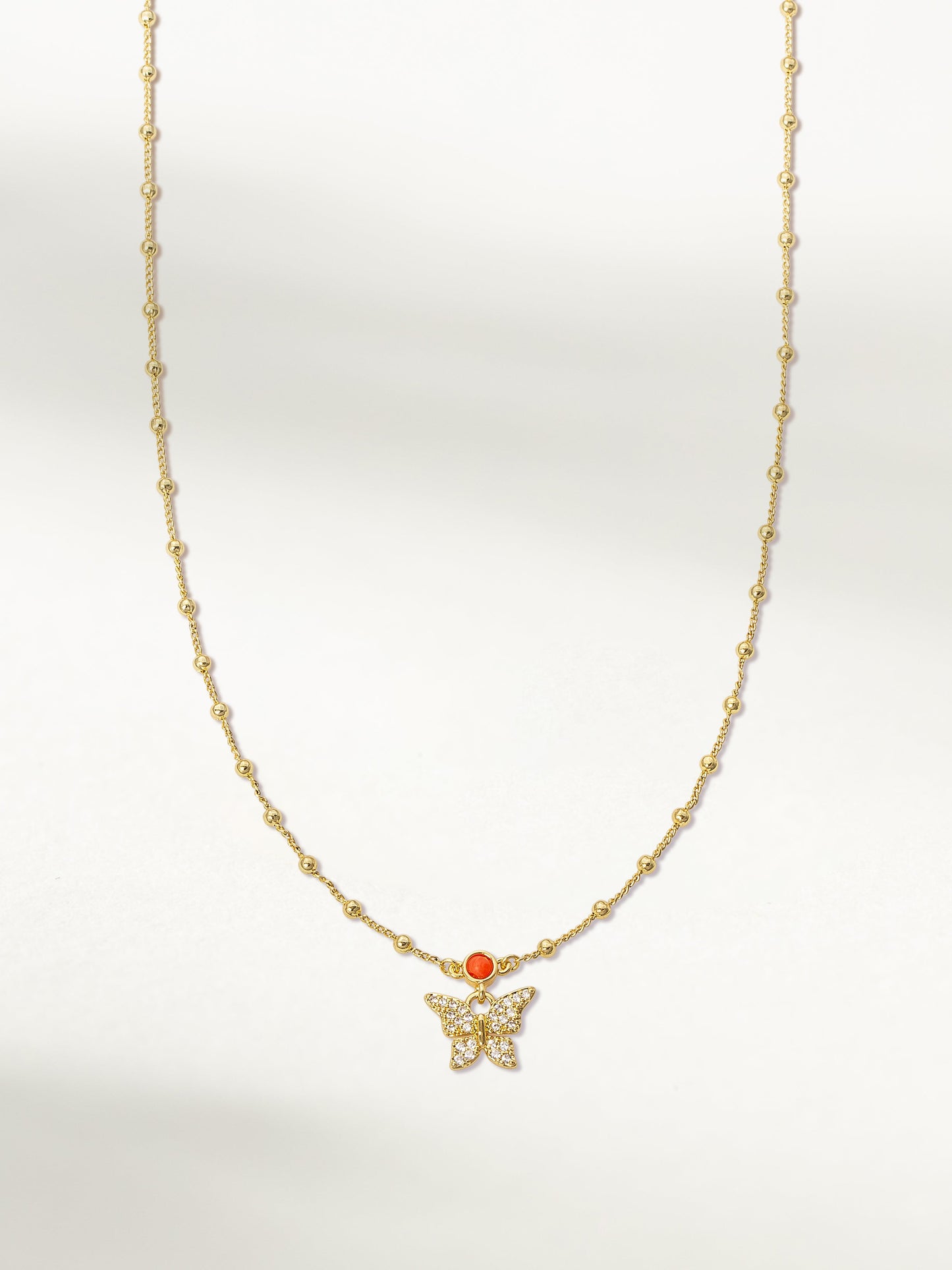 Collier pendentif jardin de papillons