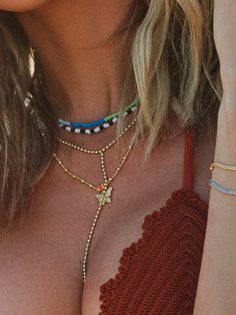 Collier pendentif jardin de papillons