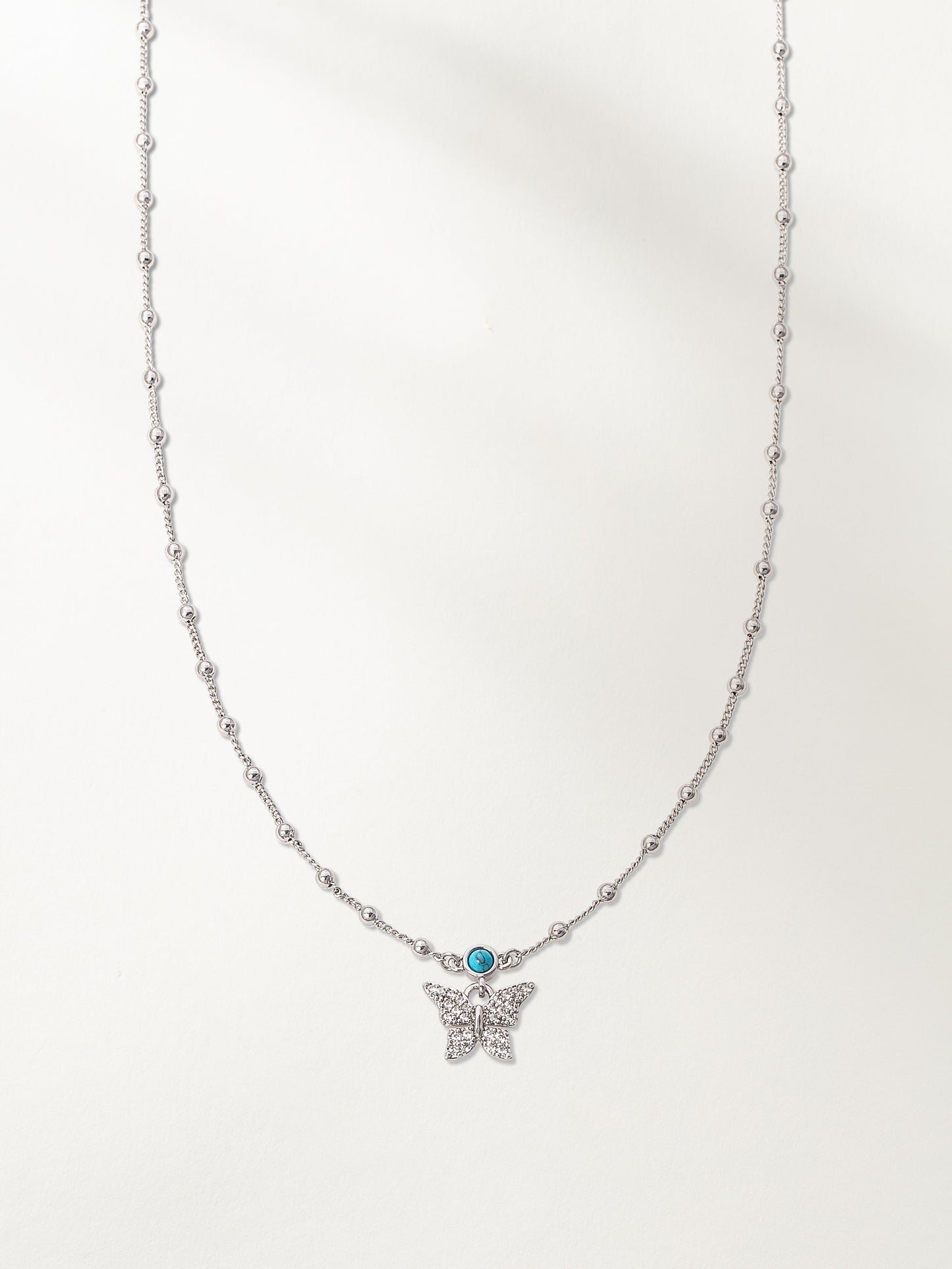 Collier pendentif jardin de papillons