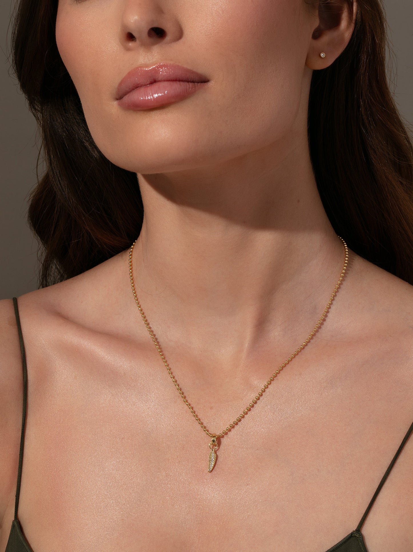 Breloque en forme de plume