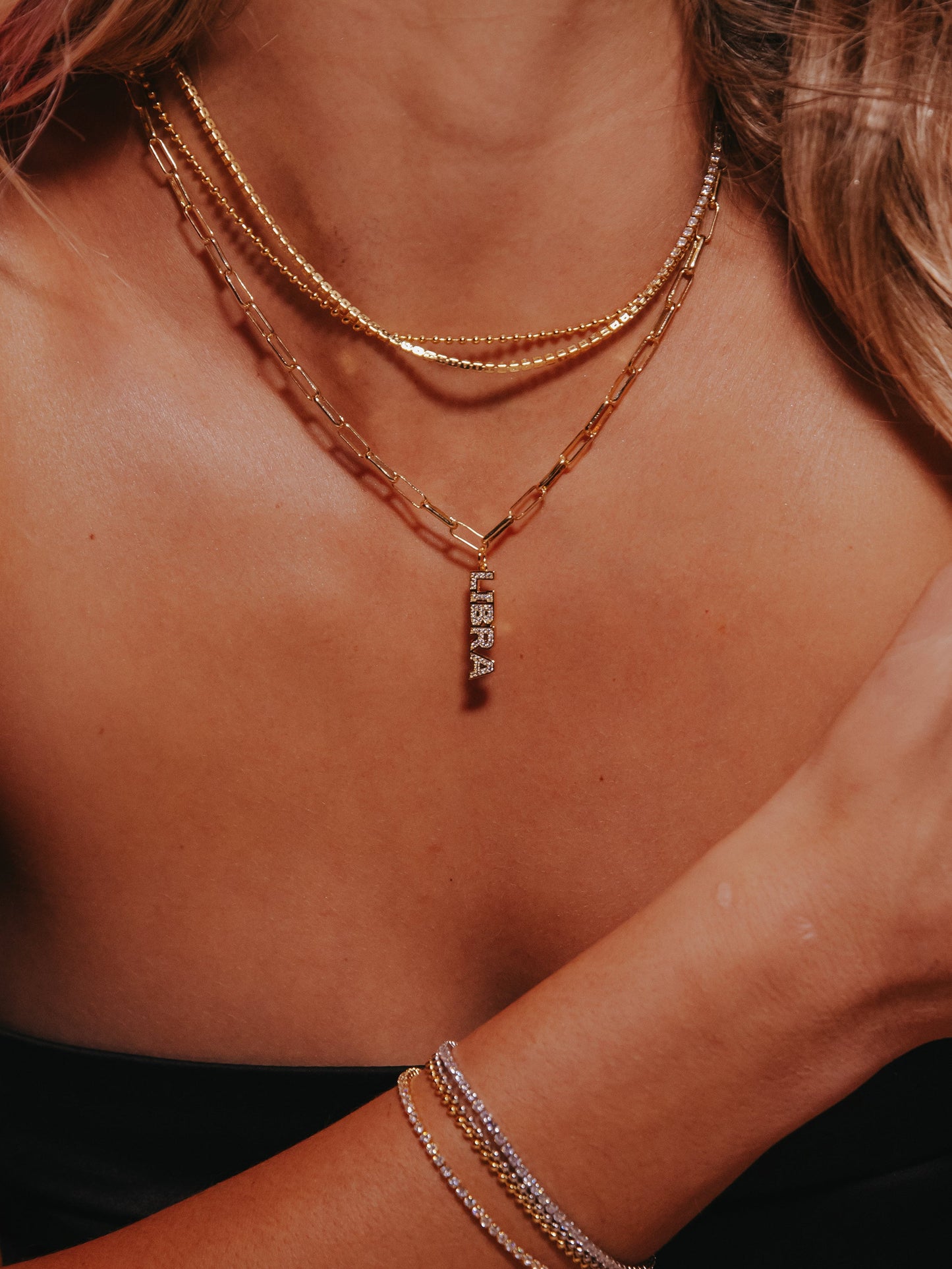 Collier pendentif avec plaque signalétique du zodiaque