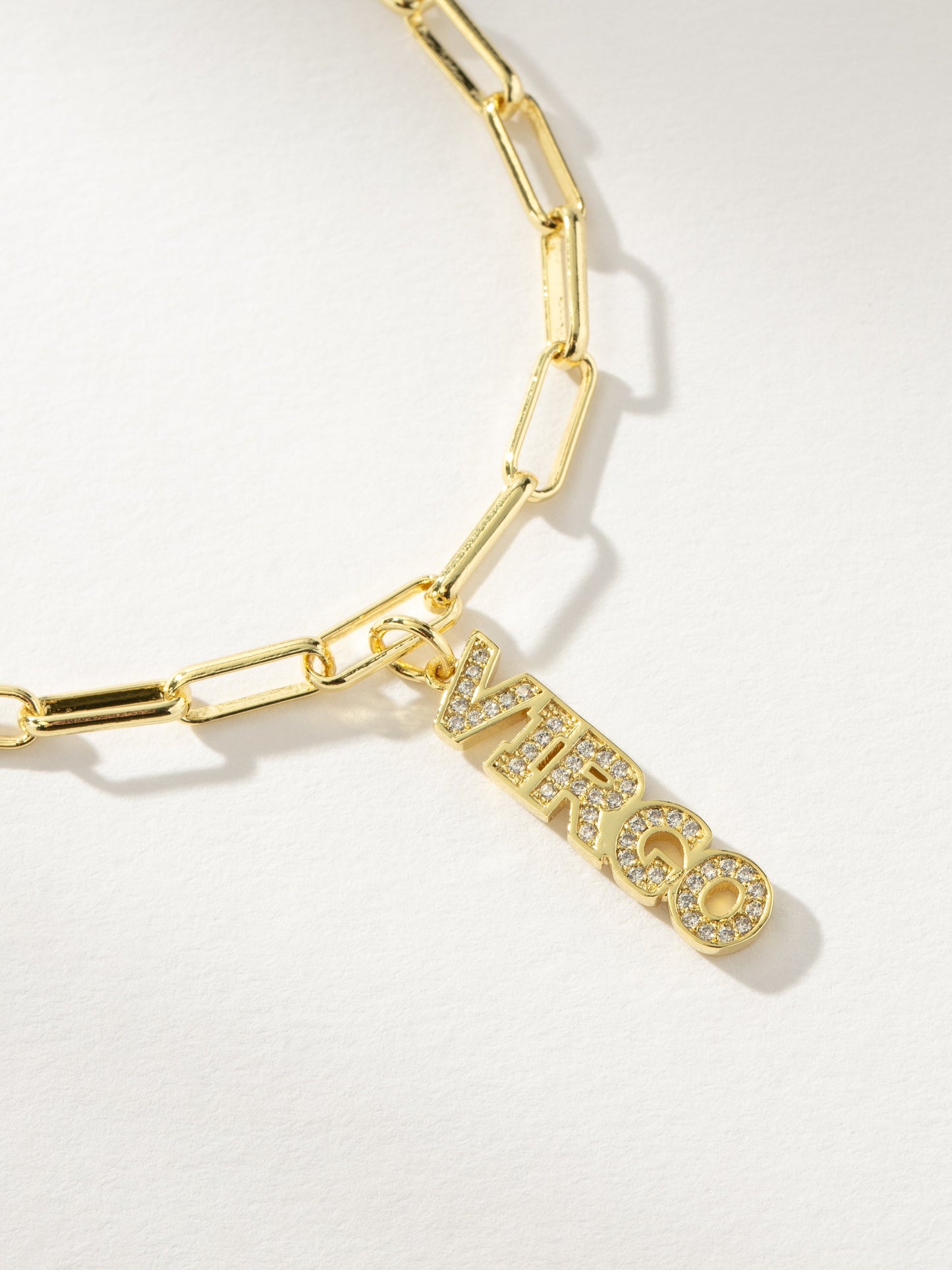 Collier pendentif avec plaque signalétique du zodiaque