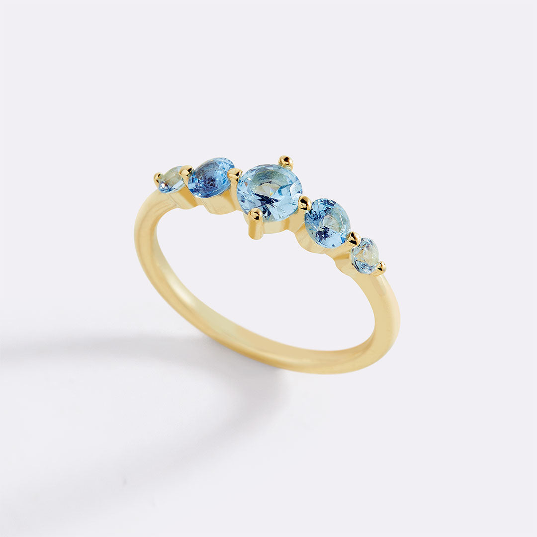 Bague de déclaration à cinq pierres de naissance