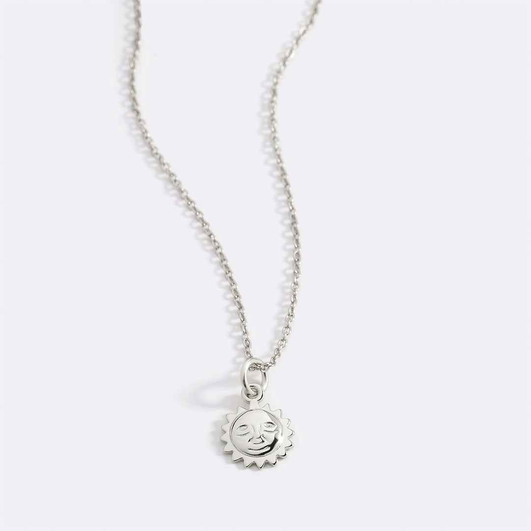 Collier pendentif breloque soleil