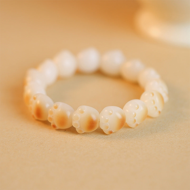 Joli bracelet Bodhi en patte de chat brûlée au charbon de bois