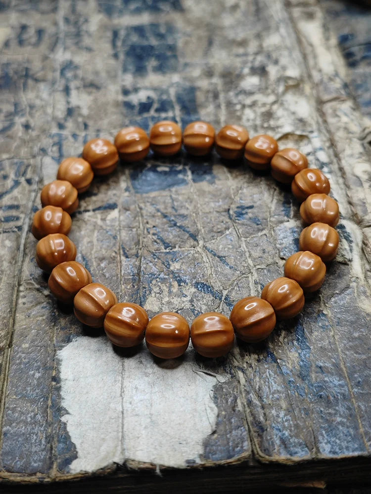 Small Walnut Carved Shark Fin Bead Bracelet
