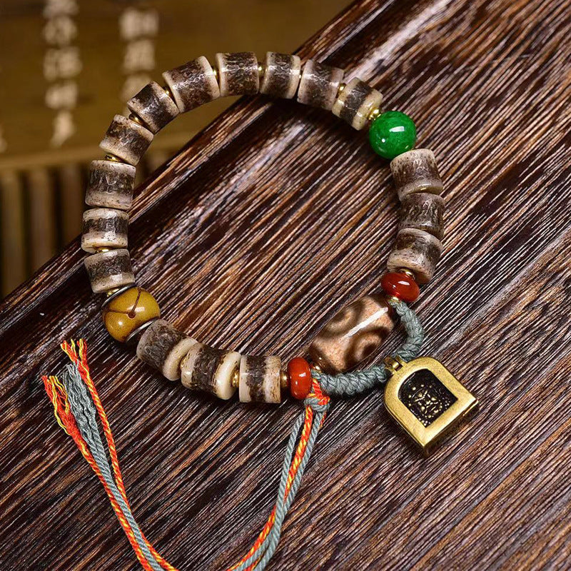 Bracelet tibétain en os de yak avec perles d'agate dzi et perles de neige Baga – Bracelet artisanal de style tibétain