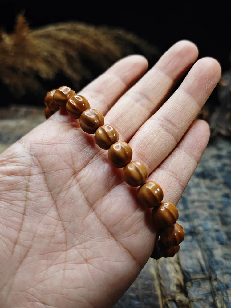 Small Walnut Carved Shark Fin Bead Bracelet