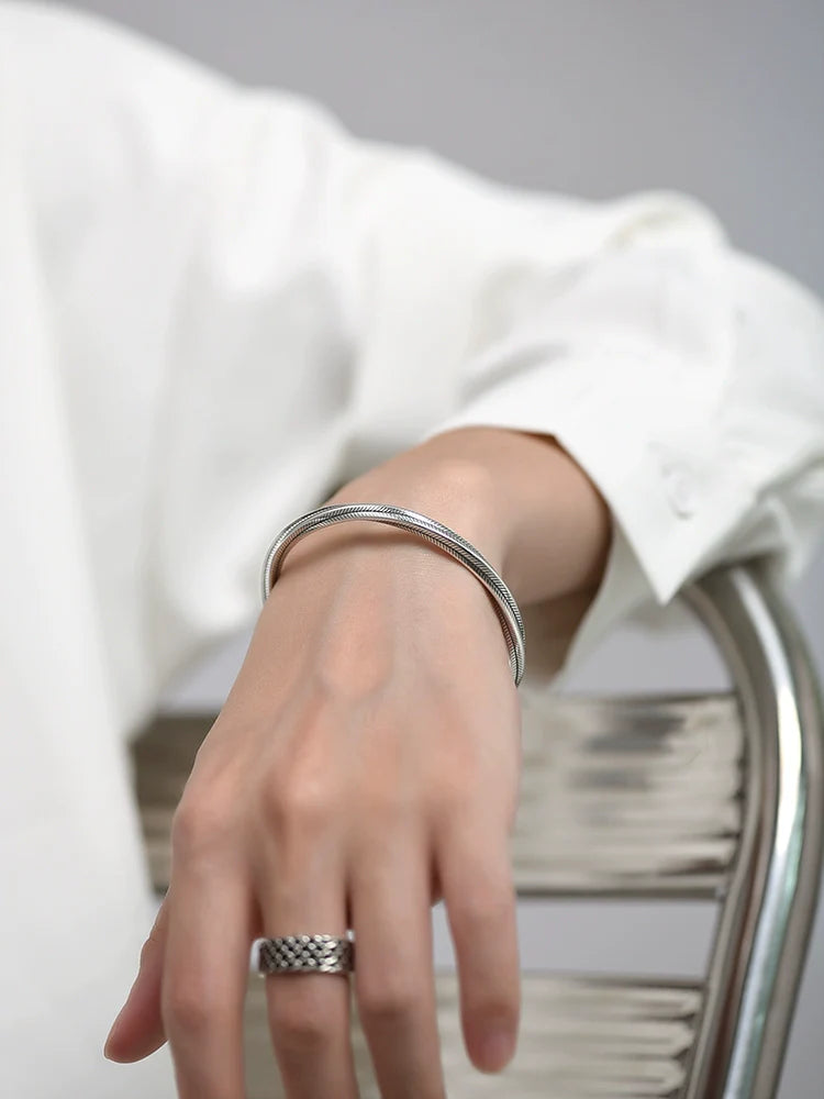 Bracelet boucle Mobius en argent pur