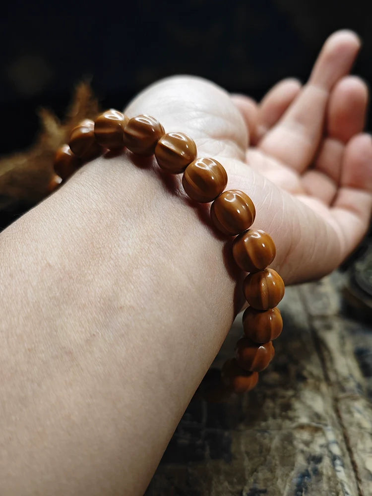 Small Walnut Carved Shark Fin Bead Bracelet