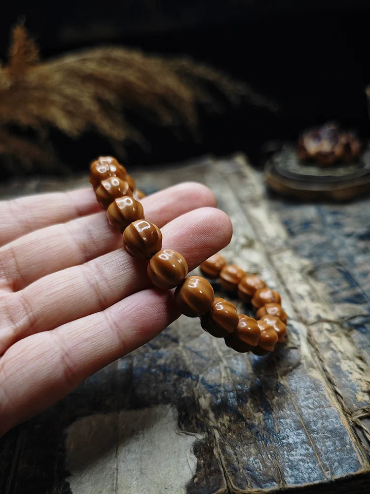 Small Walnut Carved Shark Fin Bead Bracelet