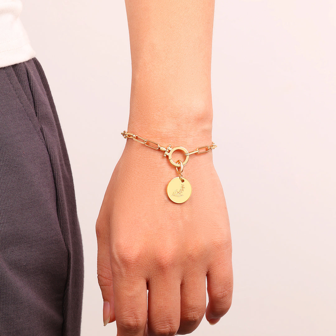 Breloque disque fleur de naissance gravée