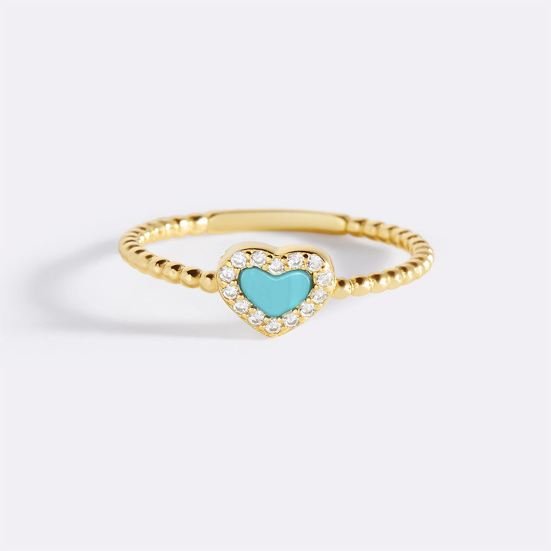 Bague en forme de cœur avec petite pierre précieuse