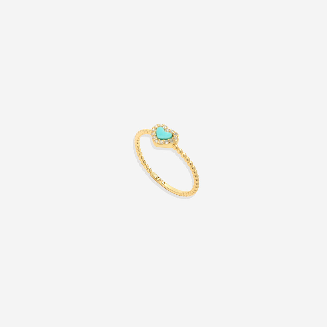 Bague en forme de cœur avec petite pierre précieuse