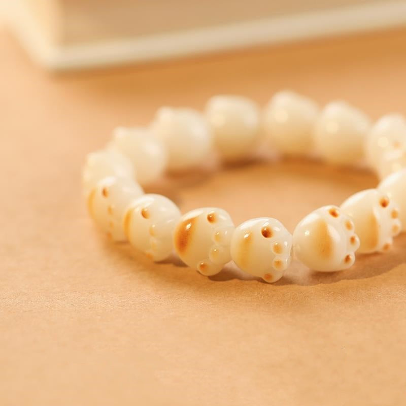 Joli bracelet Bodhi en patte de chat brûlée au charbon de bois
