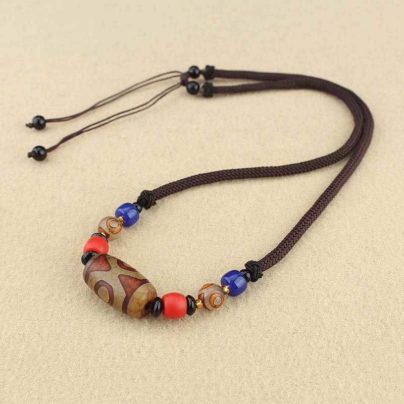 Pierres de Bouddha Perle Dzi tibétaine à neuf yeux Perle Dzi à trois yeux Colliers de protection Pendentif