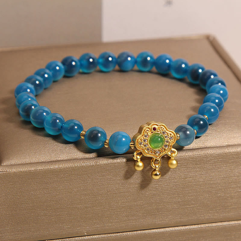 Bracelet de guérison à breloques en agate bleue et pierre de Bouddha