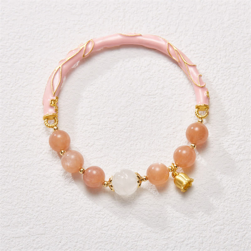 Bracelet jonc à breloques positives en jade et soie dorée, pierre de soleil et bouddha