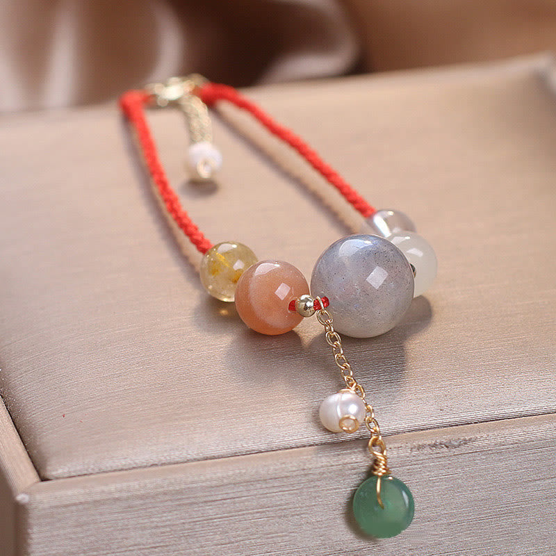 Bracelet de guérison avec breloque en pierre de lune et pierre de soleil, pierre de Bouddha et boucle de paix