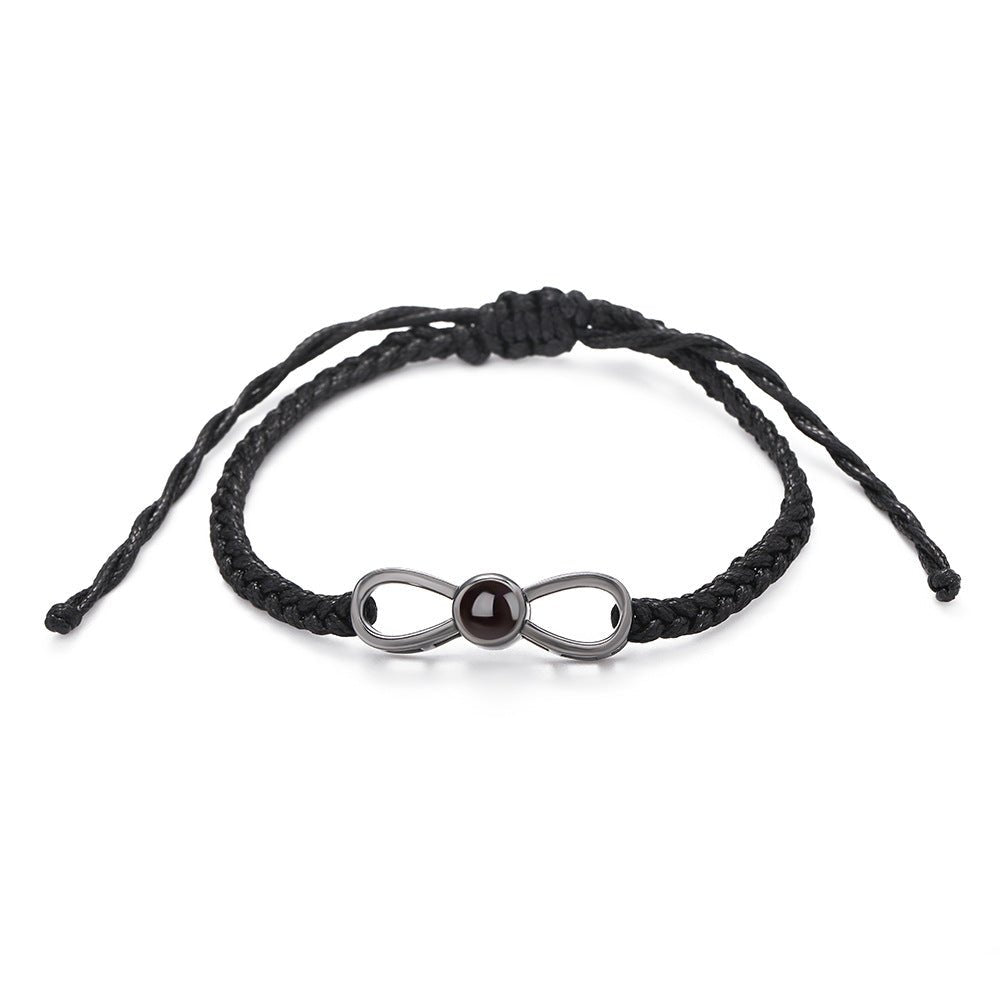 Benutzerdefiniertes geflochtenes Infinity-Zirkonarmband mit versteckter Fotoprojektion