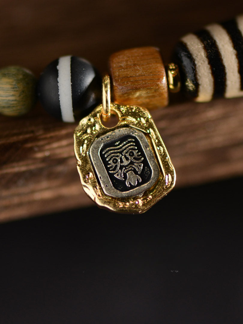 Bracelet de perles Dzi à deux yeux en agate de bois de santal vert