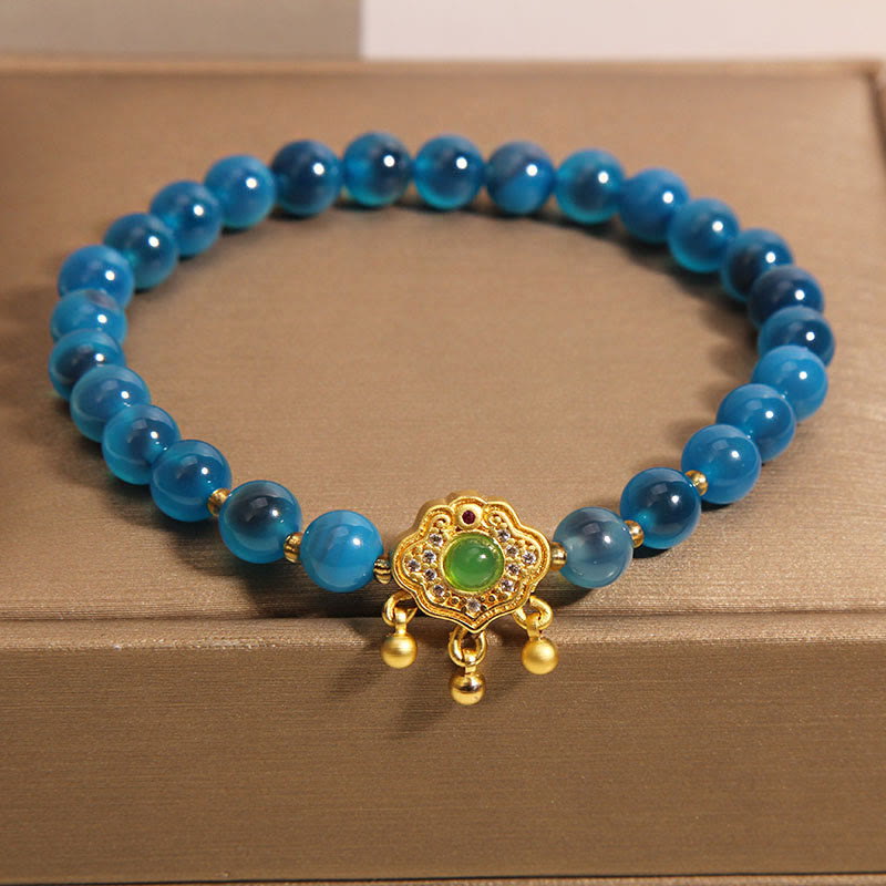 Bracelet de guérison à breloques en agate bleue et pierre de Bouddha