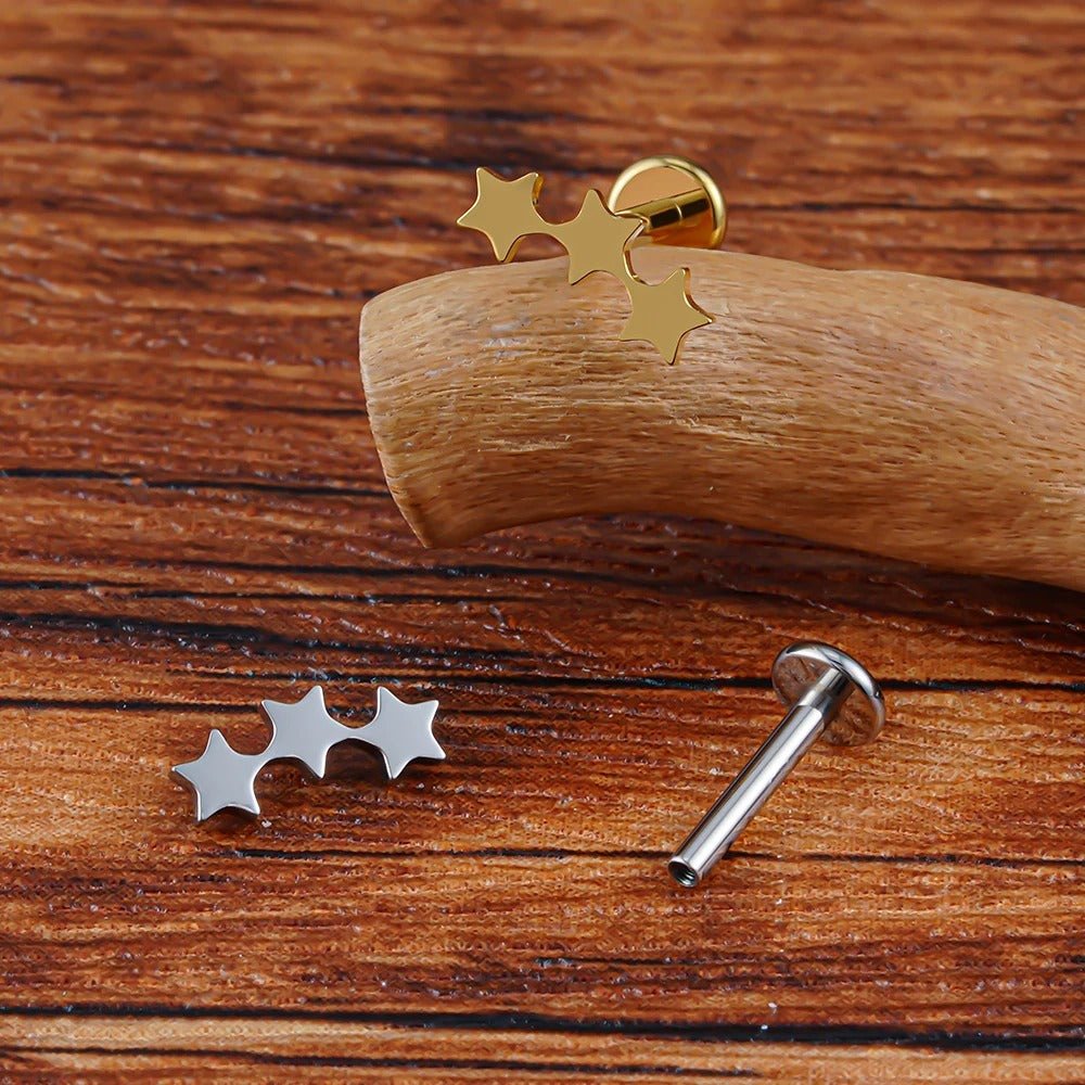 Boucle d'oreille dormeuse triple étoile