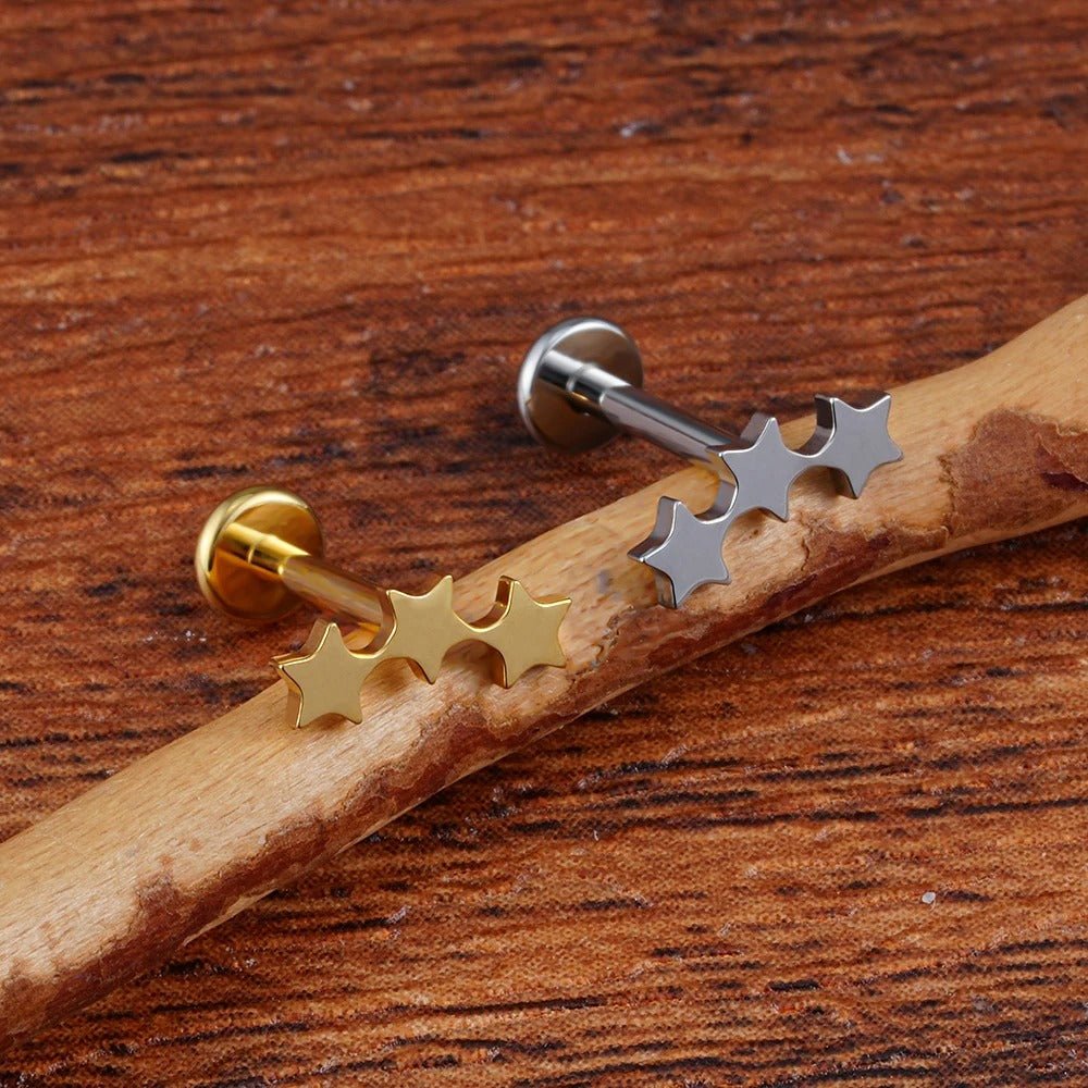 Boucle d'oreille dormeuse triple étoile